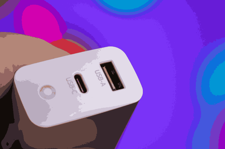 Slim power bank USB ports and LED battery indicator close up