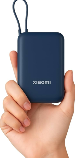 Slim portable power bank in bag for travel